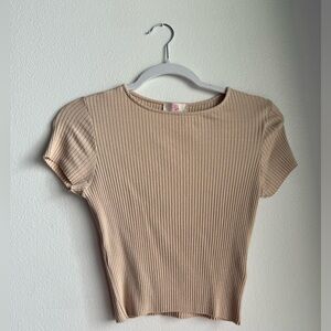 super cute beige top matches with anything! never been worn before